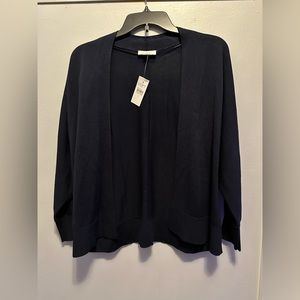 Navy blue sweater with no buttons. Brand new with tags